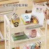 Estante de armazenamento pequena com rodinhas, multicamadas com rodas, estante móvel para ao lado da mesa, estante de armazenamento de livros para salas de aula de estudantes, estante de chão