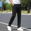 Calças casuais versáteis masculinas folgadas retas elásticas calças de terno outono novo negócios slim fit trabalho calças de outono masculinas
