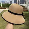 Chapéu de Palha Dobrável de Aba Larga para Verão Feminino 2026 Novo Modelo Proteção UV Fashionável Versátil Chapéu com Proteção Facial de Topo Aberto para Viagem