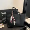 Bolsa de mano de alta calidad para mujer, gran capacidad, estilo coreano, con detalle de cinta, vintage y a la moda, adecuada para ir al trabajo, bolso de hombro, bolsa de cuero PU de calidad de exportación
