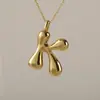 Venta Caliente Transfronteriza 18K Liso Lindo Versión Q Gordito Burbuja Colgante Alfabeto 26 Letras Estilo Minimalista de Nicho