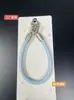 Nova pulseira de couro triangular com fivela dupla para celular, acessório universal, pulseira simples com fivela dupla, corrente de suspensão anti-queda
