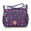 Bolso Cruzado de Hombro Personalizado Nuevo Simple Literario Casual Tela Lavada Impermeable Lona Tela de Nylon Estilo Coreano Bolso de Moda para Mujer