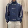 AliExpress 2026 Otoño Nuevo Estilo Callejero Americano Versátil Patchwork Chaqueta con Cuello Alto Moda Camisa de Botones con un Toque de Alta Gama