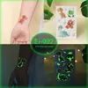 Pegatinas de Tatuaje de Dibujos Animados para Niños, Mundo de Dinosaurios Luminoso, Pegatinas Temporales Impermeables para Cara de Niños y Niñas, Stock Listo Transfronterizo