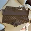 Foto Real de Saia Slimming de Cintura Alta com Estampa de Bolinhas Moda Retrô, Saia Curta Anti-Exposição, Saia Bodycon, Saia Evasê para Mulheres no Verão