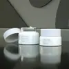 Nuevo Material de Empaque para Producto de Cuidado de la Piel Botella Transparente de Vidrio de Alta Gama Vacía 100ml Empaque de Bomba Botella Especial para Sub-envasado 30g