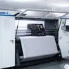 Fábrica de Impresión Fábrica de Impresión Digital Poliéster Elástico en Cuatro Direcciones Piel de Durazno Gasa Primavera Sub-Hebra Leche Seda Procesamiento Floral