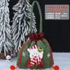 Saco de maçã de Natal transfronteiriço Saco de presente de flanela com desenho animado bronzeado com laço Sacola de presente de doces para crianças