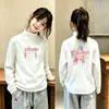 Nueva Camiseta de Manga Larga para Niñas Otoño e Invierno, Capa Base Térmica de Felpa Cálida, Cuello Medio Alto, para Niños Medianos y Mayores, Versátil Top Interior Cepillado