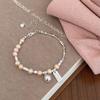 Pulsera de perlas de agua dulce de lujo para mujer, diseño de nicho ligero, elegante y sencilla pulsera de plata, joyería de mano de alta calidad.