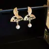 Lámpara Colgante de Perla Diamante Abanico de Aguja Plateada Lujo Temperamento Nuevo Estilo Chino Moda Nacional Pendientes Pendientes de Temperamento Personalizado Sentido Avanzado