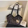 Bolsa Tote Casual de Moda Transfronteiriça de Grande Capacidade para Mulheres 2025 Outono e Inverno Nova Bolsa de Ombro para Trabalho Bolsa Ninho de Axila