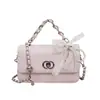 Bolso Pequeño Cuadrado Estilo Coreano Ins para Mujer 2026 Nuevo Modelo Bolso de Hombro con Hebilla de Cierre Estilo Coreano Bolso Cruzado Bolso de Mano Color Sólido para Viajes Cotidianos