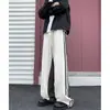 Pantalones deportivos de chándal con estampado de leopardo patchwork hip-hop americano para hombre y mujer, marca de moda de corte holgado, pantalones casuales de rayas fluidas para hip-hop y baile callejero