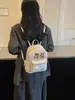 Mochila Nueva Estilo Coreano de Gamuza Oso Pequeño para Mujer 2026 Linda Dibujos Animados Estrellas Mochila Escolar Gran Capacidad Mochila Versátil