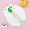 Llavero Colgante de Cordón de Cuero con Letra Transparente Brillante con Accesorios Estilo Muñeca Rellena de Aceite Encanto de Llavero Pulsera Venta al por Mayor