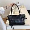 Bolsa Tote Simples Tendência de Grande Capacidade Transfronteiriça para Mulheres Verão 2026 Nova Moda Versátil Casual Bolsa de Ombro Tendência