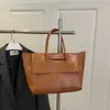 Bolso Tote Versátil de Moda de Alta Gama Transfronterizo para Mujer 2025 Nuevo Estilo Coreano Bolso de Mano Sencillo Bolso de Hombro Retro para Viajar
