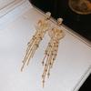 Pendientes de lujo con borlas geométricas triangulares y flores incrustadas con diamantes, de aguja plateada, exagerados, de alta gama, con diseño transfronterizo europeo y americano para mujer.