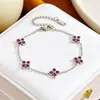 Pulseira de aço titânio com trevo de quatro folhas e strass para mulheres, best-seller transfronteiriço europeu e americano, joia requintada de luxo leve, pulseira versátil estilo europeu e americano