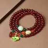 Pulseira Vermelho Vinho Anti-Granada com Múltiplos Círculos Fivela de Segurança Pixiu Pulseira Bênção de Lótus Modelo de Joia para Transmissão ao Vivo Transfronteiriça Douyin
