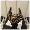 Bolsa de nicho de alta qualidade com estampa de leopardo feminina 2024, nova chegada, bolsa de ombro único, elegante e portátil, bolsa de sela