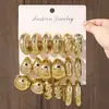 Pendientes geométricos minimalistas de estilo cruzado dorado europeo y americano, modernos y versátiles, juego de pendientes de botón plisados de gota de agua exagerados para mujer
