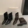 Botas de mujer de cuero suave con hebilla retro estilo páramo 2026 nuevo modelo punta fina botas cortas elegantes botas de montar a media pantorrilla de moda