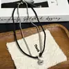Moderna Cadena Tejida de Metal y Cuero Colgante de Oso Torpe Microincrustado Collar para Mujer Cadena de Clavícula de Gama Alta de Nicho