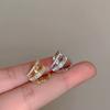 Clip de oreja Awn de estrella de circón de tres capas estilo hip hop moderno genial unisex fila multicapa Clip de hueso de oreja de estrella de diamante bienestar sin oreja