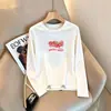 Bestseller de Almacén Lightning Marca de Moda Camiseta de Manga Larga para Mujer 2026 Otoño Invierno Holgada Gato Versátil Top de Pareja Transfronterizo Comercio Exterior