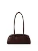 Bolso tipo baguette de cuero suave con patrón de lichi, modelo nuevo transfronterizo estilo coreano, diseño de nicho de alta gama, bolso de hombro versátil vintage adelgazante