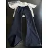 Pantalones Casuales Retro de Corte Diagonal Estilo Americano para Hombre Otoño Estilo Perezoso Pantalones de Pierna Ancha Pantalones Largos Rectos con Caída Pantalones de Microcampana de Corte Curvo