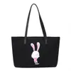 Bolsa de mano estampada modelo nuevo 2023 lona conejo pequeña fresca gran capacidad casual bandolera de hombro de moda versátil bolsa para mujer
