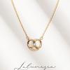 Amor Entrelaçado S925 banhado a ouro 18K zircônia bolsa de nó alcalino fofa pingente de colar de prata esterlina minimalista e meticuloso