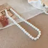 Hebilla de lingote de oro barroco collar de perlas clásico retro francés cadena para la clavícula de perlas pequeñas guisantes cadena para suéter suéter