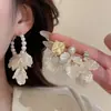 Conjunto de Dez Brincos Pingente Flor de Pérola Agulha de Prata e Diamante, Brincos Modernos e Versáteis, Brincos Retro de Luxo Leve para Mulheres