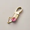 Llavero de cuerda trenzada de fábrica, accesorios de ferretería, hebilla de herradura, colgante para llave de coche, accesorios de moda para coche