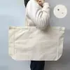 Bolsa de Lienzo en Blanco al por Mayor de Fábrica Estilo Coreano Pintura a Mano Graffiti Personalizada Bolsa Bandolera Blanca Hombro Logo Bolsa de Lienzo