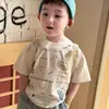 Camiseta de Manga Corta para Niños Ropa de Verano para Niños 2026 Nuevo Delgado Blanco con Letras Cuello Redondo Conjunto de Shorts de Mezclilla