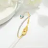 Pulsera de Acero Dorado y Titanio Transfronteriza Europea y Americana Que No Se Desvanece y Está Incrustada con Diamantes Diseño de Nicho Forma de Serpiente Simple Lujo Pulsera de Flor de Cuatro Pétalos