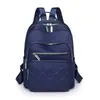 Mochila casual resistente al agua de gran capacidad, multicapa, diseño simple, adecuada para estudiantes, elegante y versátil, adecuada para ir al trabajo y viajar, para mujeres