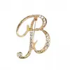 Temperamento de comercio exterior europeo y americano 26 broches de letras inglesas femenina diamante personalidad Joker moda corsage pin masculino accesorios
