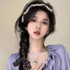 2025 Collar de Concha Dorada de Lujo Ligero para Mujer Cadena de Clavícula Popular de Nicho Accesorios de Diadema Elegantes Producto Nuevo
