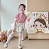 Conjunto de Verano para Niña 2026 Nuevo Estilo Camiseta de Manga Corta Infantil y Falda Floral para Bebé Conjunto de Dos Piezas a la Moda Estilo Moderno
