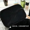 Nuevo neceser pequeño de estilo fragante para mujer versión coreana de gran capacidad ins viento explosión portátil bolsa de almacenamiento para lavado venta al por mayor de fábrica