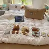 Conjunto de quatro peças de toalha de dormir estilo INS em tom nude com bordado de desenho animado, fresco e fofo, conjunto de três peças de algodão lavado bordado com algodão fofo para dormitório
