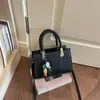 Bonita Xiaomi Home 2026 Nova Bolsa de Mão Casual Elegante Tendência Alta Aparência Versão Coreana Retrô Ombro Único Transversal Pequena Quadrada Feminina