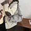 Bolsas de Felpa de Nicho Transfronterizas Otoño e Invierno 2026 Nuevo Bolso de Hombro y Axila Versátil para Mujer Bolso de Mano Texturizado Bolso de Felpa